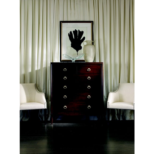 This piece is available only as shown, and will ship in 2-3 weeks. Crafted of maple solids and American walnut veneer. Two...