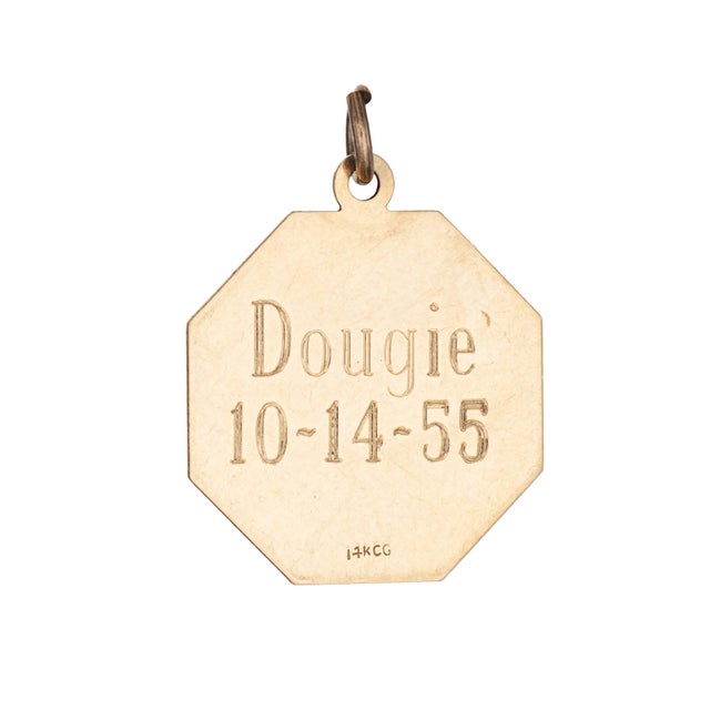Distinct & stylish vintage charm crafted in 14 karat yellow gold (circa 1955). The sweet charm "I'll Never Stop Loving...