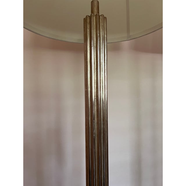 Elegant pair of floor lamps by Nancy Corzine, featuring fluted candlestick-style columns in Corzine’s signature Venetian...