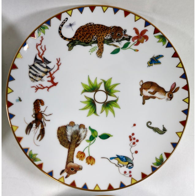 This set of four salad or dessert plates is by Lynn Chase, known for her stunning wildlife art. Each 8.5-inch plate...