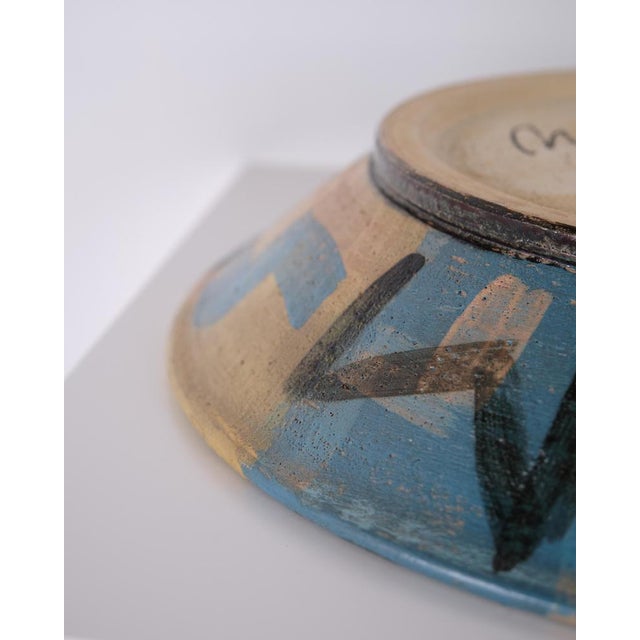 Unique ceramic dish executed and signed by the Danish ceramic artist Per Weiss (b. 1953) in 1990. The dish is decorated in...