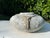 A striking vintage studio pottery vessel featuring a beautifully textured surface and weathered limestone-toned finish....