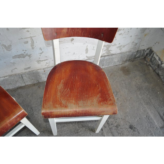 White and brown retro chairs, with painted pine and wood fiber stool. Original. Measures: Length (Depth) 14.17 in Width...