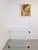 Painting: An abstract composition in a white frame, signed W.B. and dated 1993 in the lower right corner. The painting is...