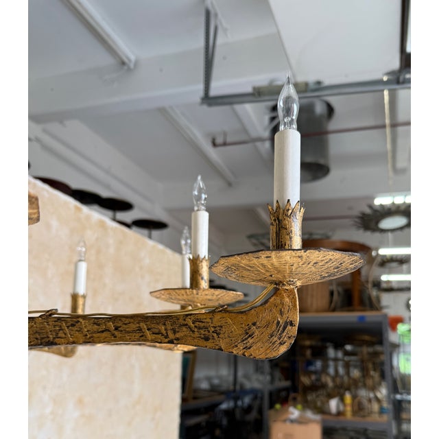 Spanish 1950’s Gilt Iron Twelve-Arm Chandelier With Opaline Glass Center Light For Sale - Image 4 of 18