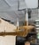 Spanish 1950’s Gilt Iron Twelve-Arm Chandelier With Opaline Glass Center Light For Sale - Image 4 of 18