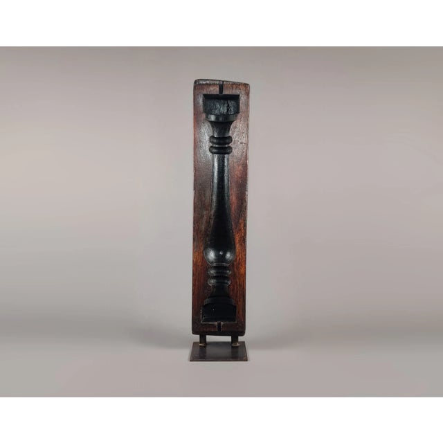 A tall vintage hand-carved timber mould for a concrete baluster, made from a very heavy and richly-coloured hardwood,...