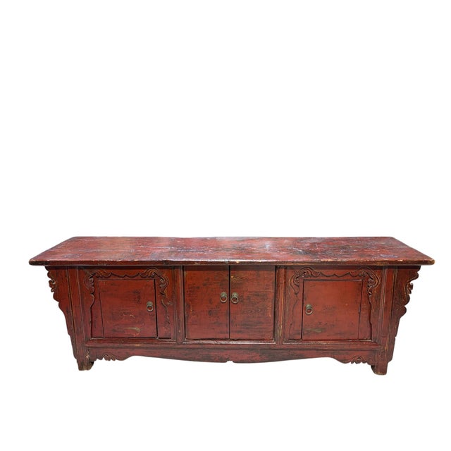 This Old Chinese altar cabinet, known as the "Butterfly Cabinet" in China, reflects the refined aesthetics that influenced...