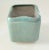 This is a ceramic turquoise speckle planter by Parker Glidden. This piece was made in America, c.1940-1957.