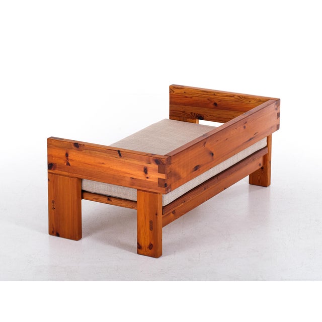 Probably unique 2-seat sofa handcrafted massive pine sofa by Roland Wilhelmsson and executed in Ågesta 1970s, Sweden. This...
