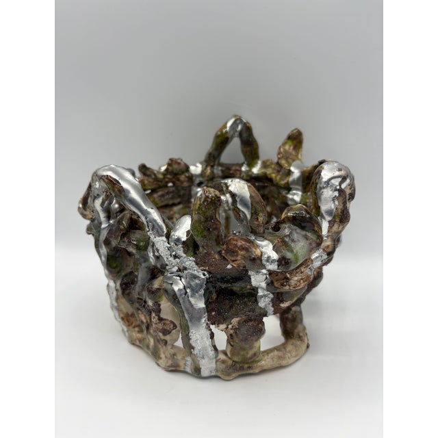 One-of-a-kind ceramic and chrome sculpture.