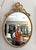 This Vintage Carvers' Guild Rope & Tassel Bow Oval Wall Mirror features an elegant oval form framed in richly gilded rope...
