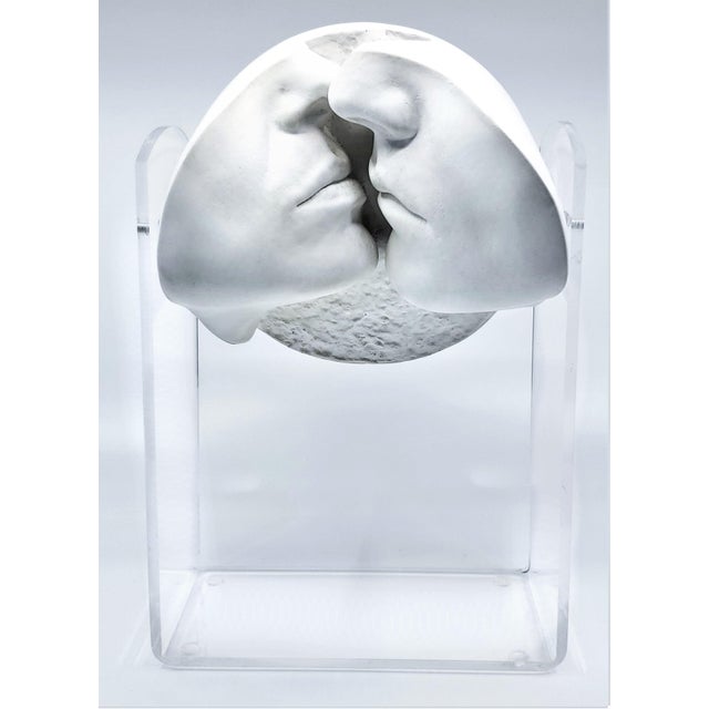 Offering a vintage swivel Lucite and plaster table sculpture signed by the artist for Austin Productions 1983. This...