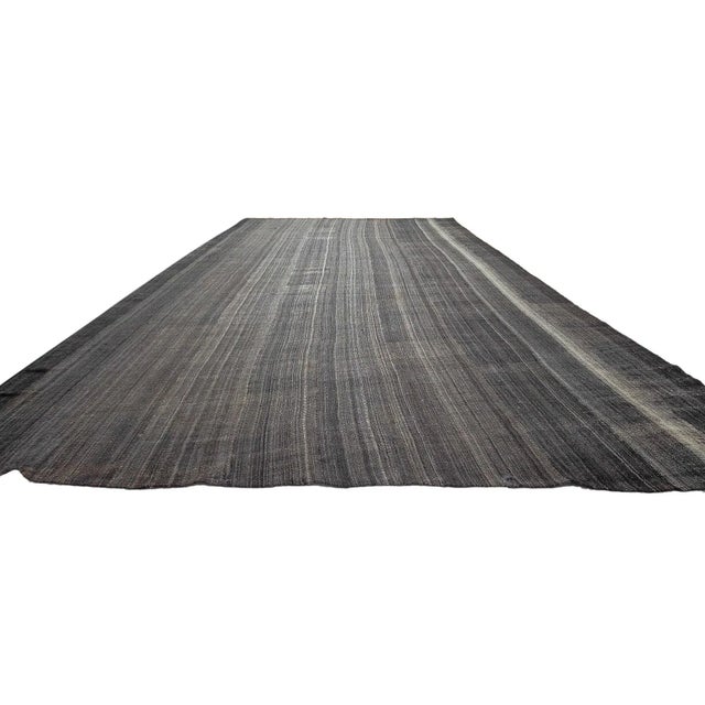 Oversized vintage gray kilim rug from Afyon region of Turkey. Approximately 65-75 years old. In very good condition.