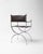 This chair is a refined example of French Mid Century design, drawing on the historic Savonarola, or curule, X frame form,...