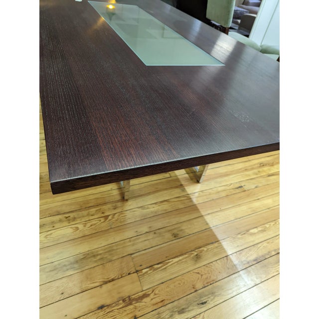Beautiful walnut table with sandblasted glass inlay. Stainless steel base