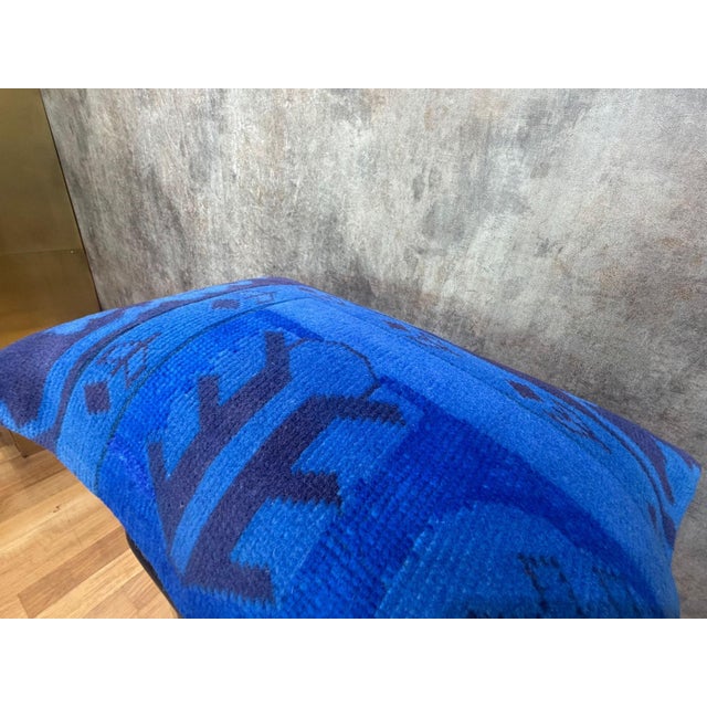 Cut and sewn from a vintage hand-knotted Anatolian rug, this lumbar cover brings a full section of the original pile...