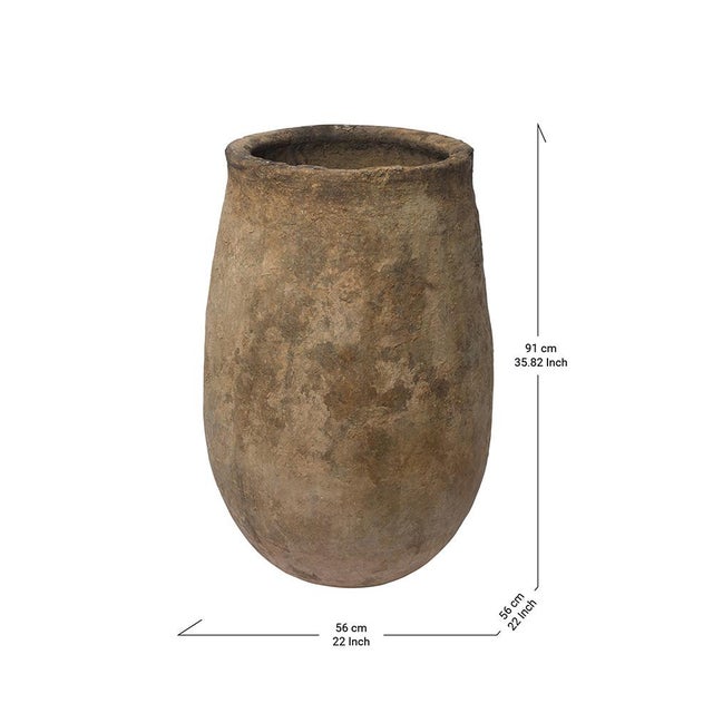 Ancient Berber Clay Jar Bring a piece of Moroccan heritage into your home with this antique clay jar, crafted over nine...