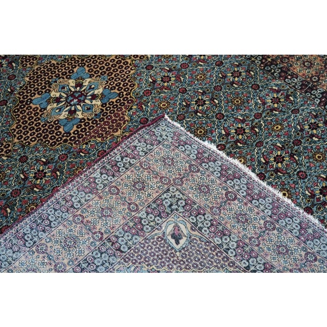 The perfectly proportioned light blue field supports an even stepped diamond trellis of larger and smaller reserves,...