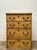 There are antiques that have been carefully protected from life, and then there are those made beautiful because of it....