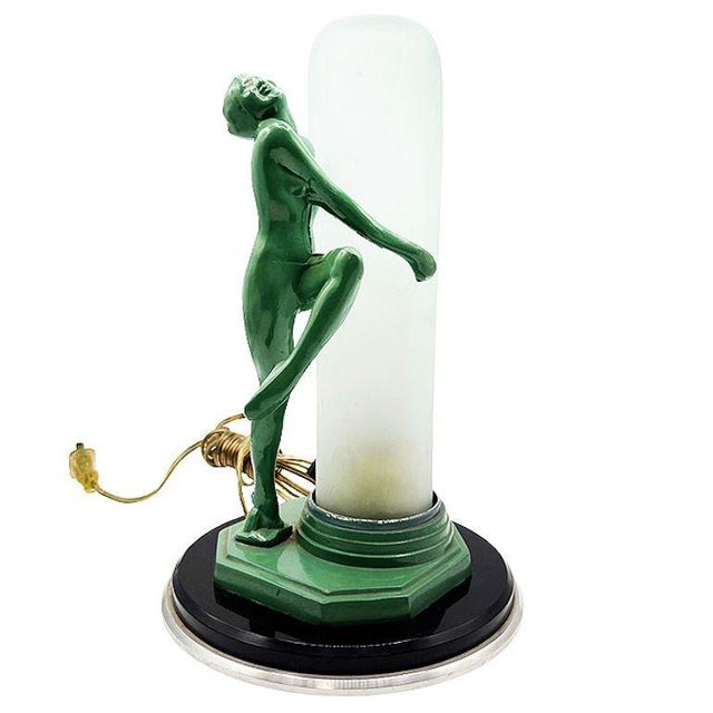 Re-Edition of the Frankart F612 Lamp with a frosted glass Shade featuring the classic "nude nymph" dancer Frankart was...