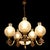 A beautiful French vintage 5-arm chandelier crafted from solid brass, featuring 15 detailed lion heads decorating the...