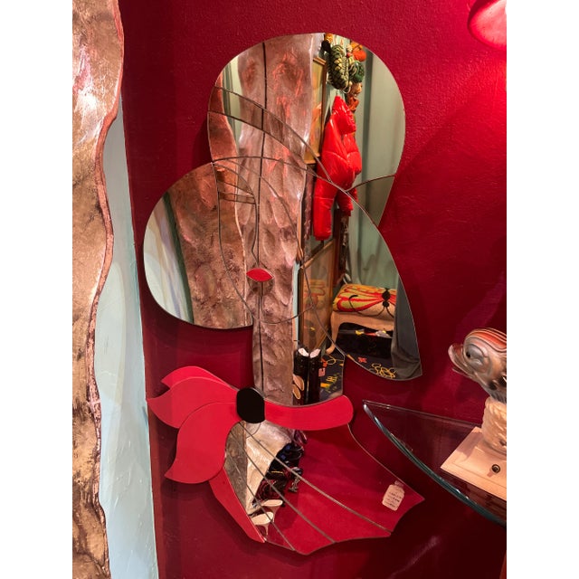 Large mirror in the shape of a lady with a hat . In very good condition please see photos for specifics. She is 46 inches...