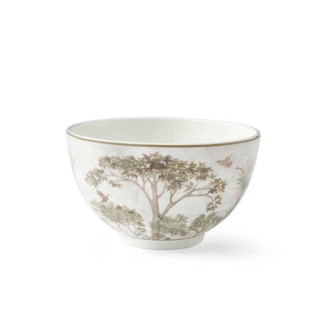 Dress your table with intriguing patterns using the Kit Kemp for Spode collection. Featuring a design of treetops in...