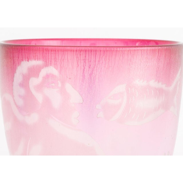 Steven Newell (American, b. 1948) Pink Etched Art Glass Bowl, 1981, depicting a nude male figure swimming with two fish,...