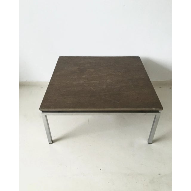 This Brutalist coffee table, consists of a solid steel frame with natural stone. It was most likely produced by Spectrum...
