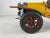 This is a mid century vintage antique automobile model. This handmade model has its original mustard yellow paint with...