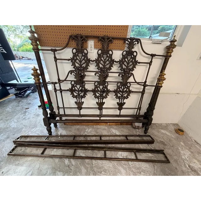 Designer iron queen bed. Heavy. Well made. Complete. Supports in middle. Dims 60 inches wide by 80 inches long 54’’ tall....