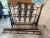 Designer iron queen bed. Heavy. Well made. Complete. Supports in middle. Dims 60 inches wide by 80 inches long 54’’ tall....