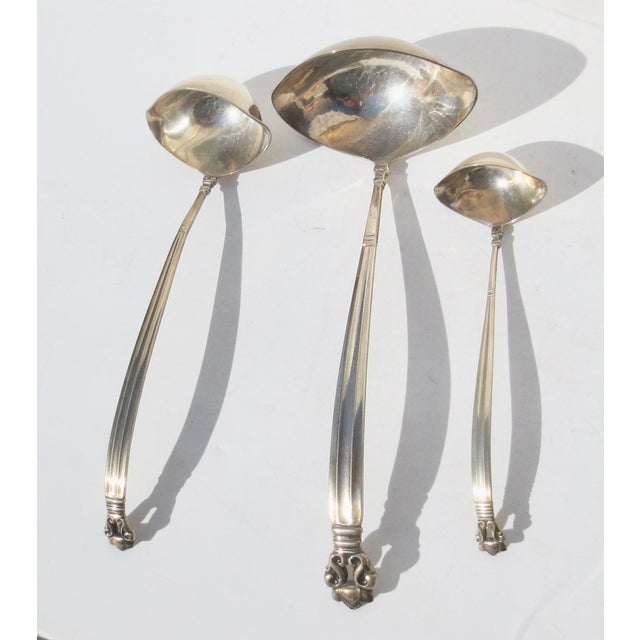 set of 3 Cream Ladles. Georg Jensen Acorn Pattern, circa 1915. All are hallmarked on the back: Jensen STERLING. The...