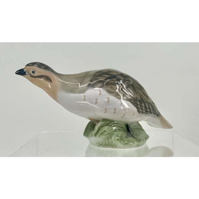 Beautiful nand painted porcelain figurine by Peter Herold for Royal Copenhagen . Soft colors, realistic details. Beautiful...