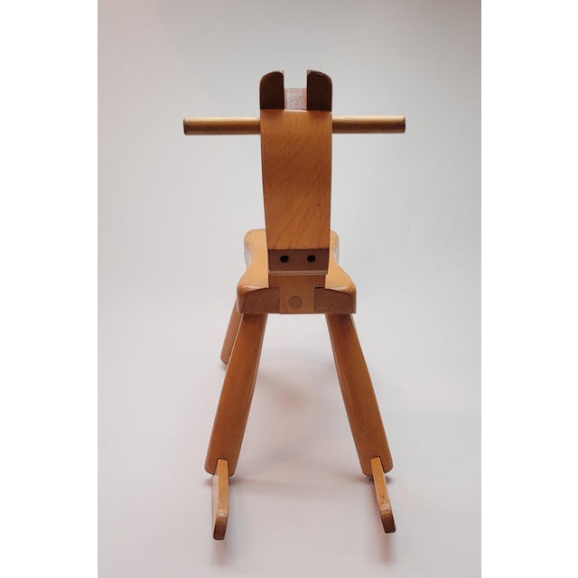 Vintage solid beech wood rocking horse designed and created by Kay Bojesen, Denmark. Signed/Stamped to underside Kay...