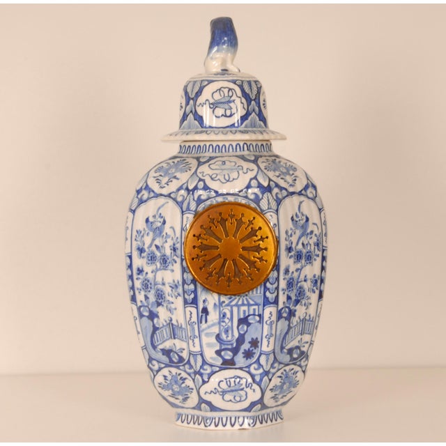 Antique Delft Vase Clock by Boch Belgium. An unique striking and decorative antique Delft vase clock in the traditional...