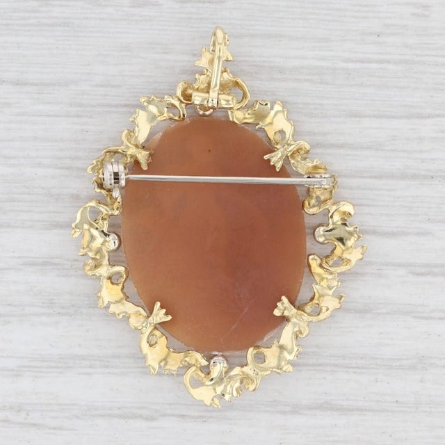 Gem: Carved Shell Cameo - 22 x 30 mm, Oval Shape, Coral & White Color Metal: 18k Yellow Gold (XRF tested) Weight: 7.7...