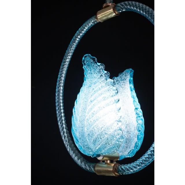 Stunning Murano chandelier by artist Ercole Barovier in rare blu color. The pendant consists of 6 glass elements and a...