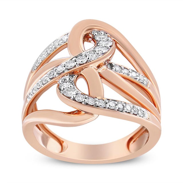 Intricately crafted, this 10k rose gold cocktail ring has a unique intertwined multi-loop design. Loops of rose gold...