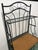 Wrought iron shelf with bottle holder and three shelves. Dimensions: 70x173x50 cm