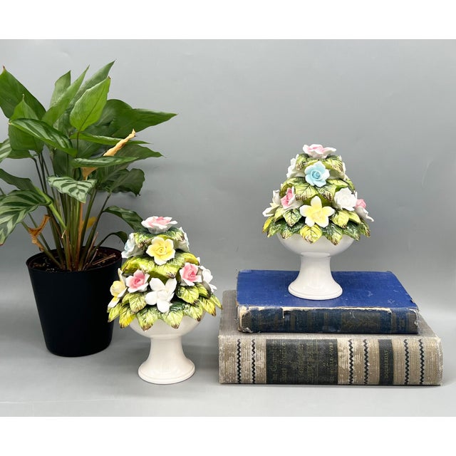 Exquisite and petite pair of vintage floral topiaries overflowing with delicate sculpted blooms in soft pastel shades of...