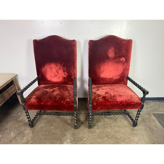 These armchairs are classic examples of Baroque-style seating, most likely French or Spanish in origin, dating from the...