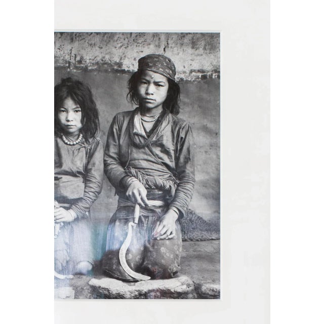 Sisters Kanchi and Thuli with sickle Lachary Village, Nepal 1984 Kevin Bubriski 4/25