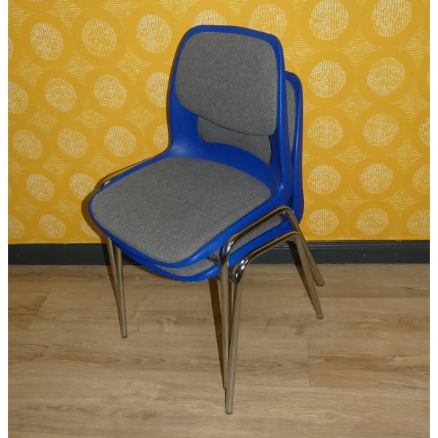 Practical and colorful in a set of two! the stacking chair has been a classic for decades iconic, for example, the europa...