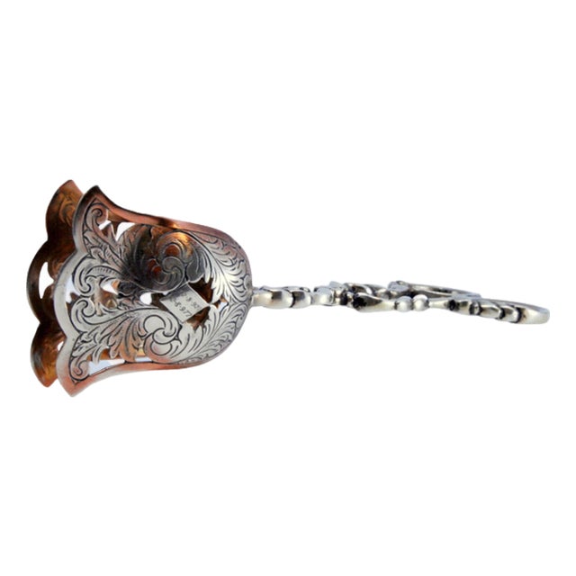 Silver Salad Tongs with Intertwined Shells and Stems For Sale