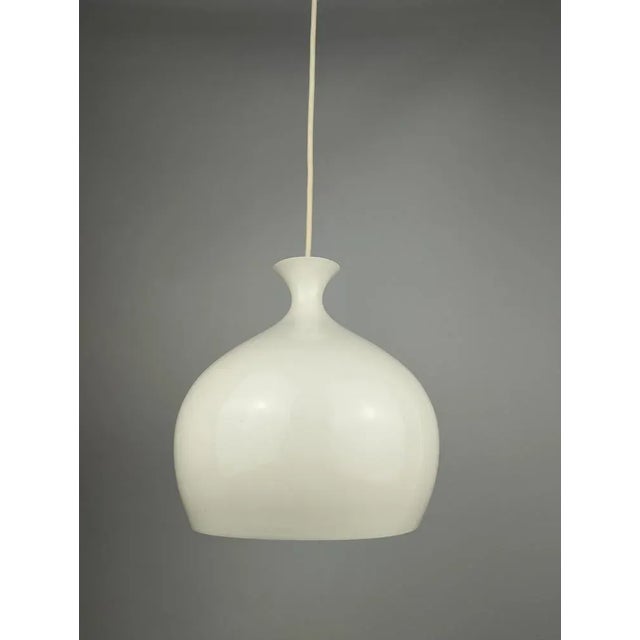 The Swedish architect Helge Zimdahl (1903-2001) designed these two elegant pendant lights with the name "Löken" (Swedish...
