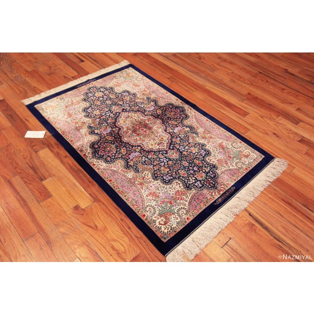Luxurious Fine Small Size Vintage Floral Persian Silk Qum Rug, country of origin: Persian Rugs, Circa date: Vintage