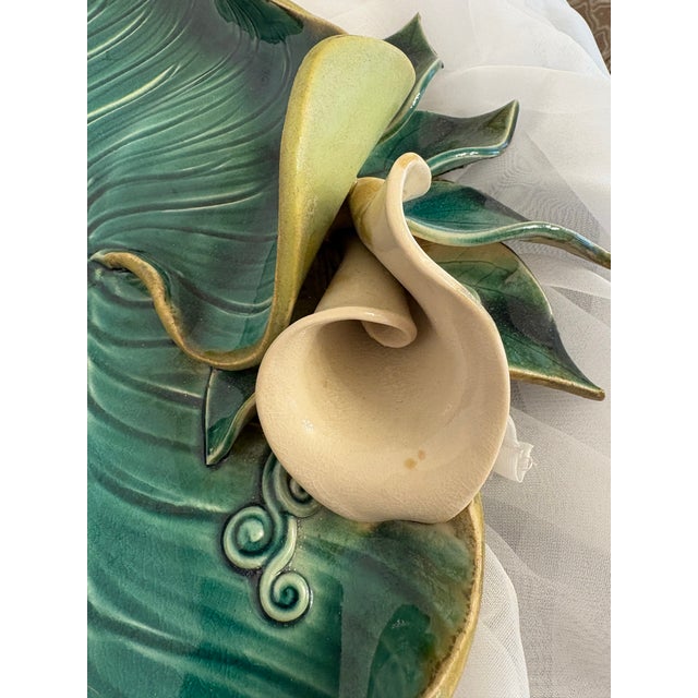 Amongst a collection of antiques at a coffee shop in a small town in Oregon, I found this rustic handmade callalily...