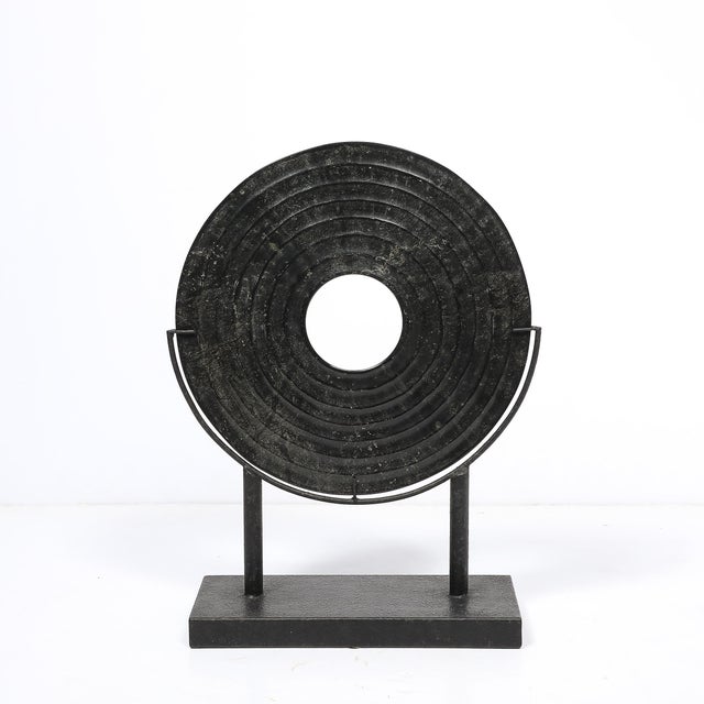 This Mid-Century Modernist bi-disc sculpture by Holly Hunt, crafted in black sandstone, is a captivating example of...